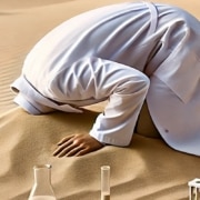 met de kop in het zand